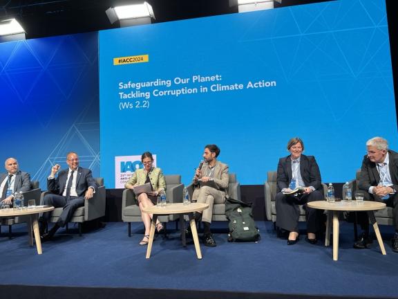 IIU Head Karen Ernst, second from right, and panelists at the IACC.